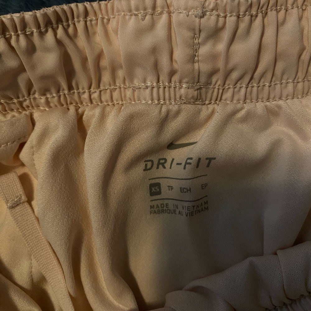 Nike Peach Agave Dolphin Hem Athletic Shorts - Picture 6 of 6